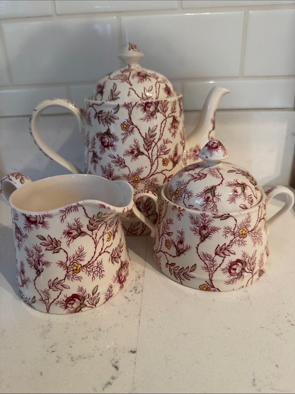 Spode Rosebud Chintz teapot, creamer and sugar box